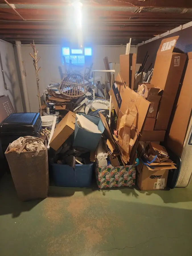 Roll-off dumpster container at job site for 4 Yard Dumpster Rental in Severn